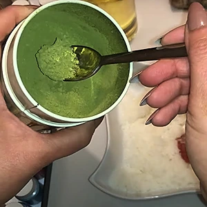 Adding the matcha tea powder