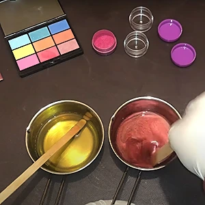 Mixing the mica color with half of the melted ingredients