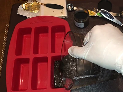 DIY Charcoal Soap - Pouring the mixture into the mold