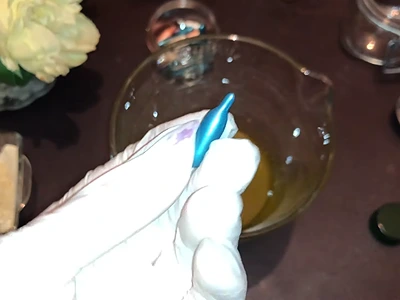 DIY Frankincense Oil Extract- Adding the vitamin E capsule