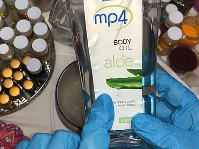 DIY Aloe Vera Gel Scrub - Adding the aloe vera body oil