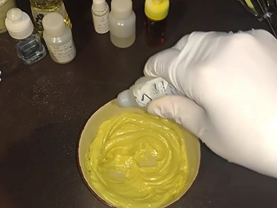 DIY Lemon Body Butter - Adding some drops of lemon essential oil