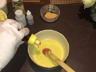 DIY Lemon Body Butter - Adding the yellow oil color