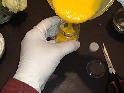 DIY Vitamin C Night Cream - Pour the mix into a container for storage 