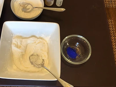 How to Make Body Scrub. Add blue nila powder to a separate bowl