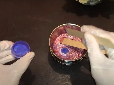 DIY Easy and Natural Lip Balm. Adding purple mica color to the remaining mix