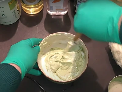 DIY Matcha Body Butter. Using a spoon first, mix the matcha powder