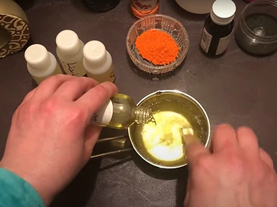 DIY Rose Body Splash. Slowly pour the colored water over the mix in the cup, while stirring