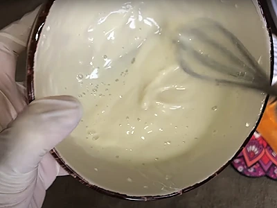 DIY Aloe Vera Body Cream. Mix thoroughly