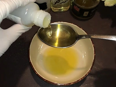DIY Split End Treatment. Add garlic oil