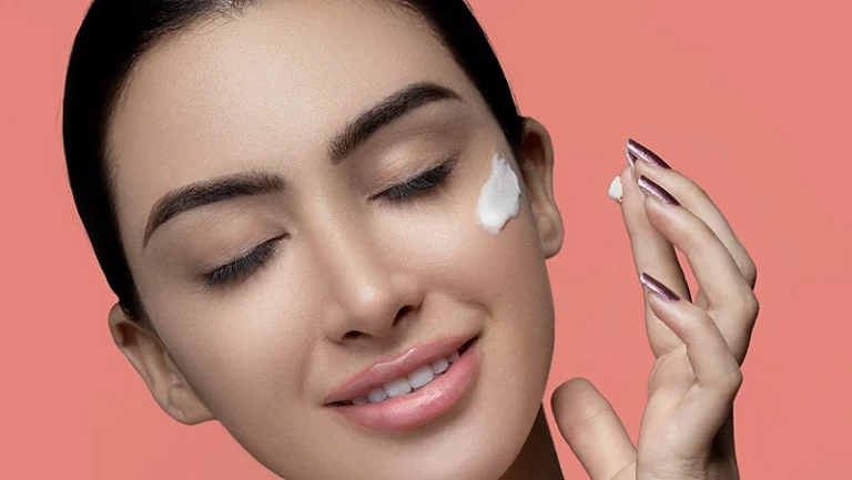 DIY Natural Makeup Primer. Woman applying primer