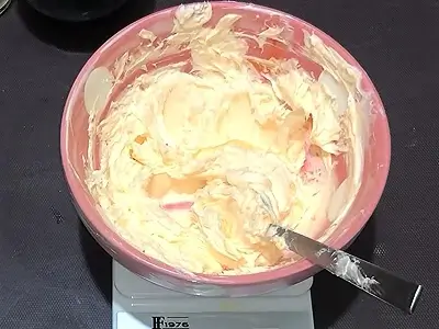 DIY Orange Creamy Soap. After mixing the color
