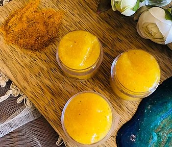 DIY Turmeric Gel Face Mask. Three containers with turmeric powder
