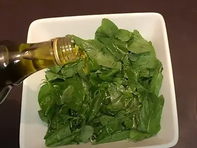 DIY Natural Mint Oil. Pour a small quantity of olive oil over the mint