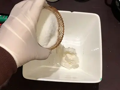 DIY Solid Scrub Bar. Add white sugar to the shea butter