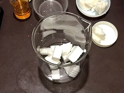 DIY Solid Scrub Bar. Put glycerine soap pieces in a beaker