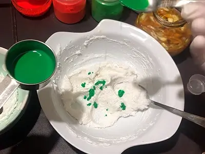 DIY Creamy Body Scrub. Add a few drops of green color to one part