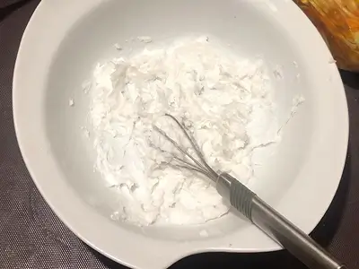 DIY Creamy Body Scrub. Add foaming bath butter in a large bowl
