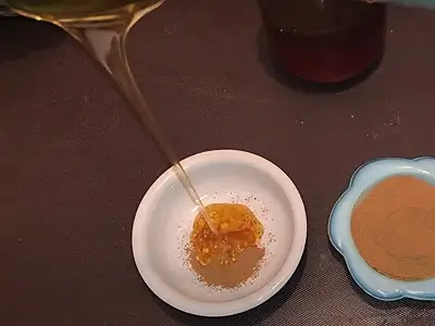 DIY Face Mask for Acne. Pour the honey over the cinnamon