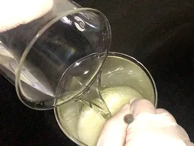 DIY Cream Base for Face. Pour the water phase over the oil phase while stirring