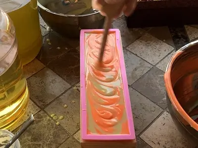 DIY Orange Cold Process Soap. Make a circular design on the soap surface