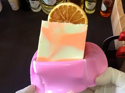 DIY Orange Cold Process Soap. Remove the soap from the mold