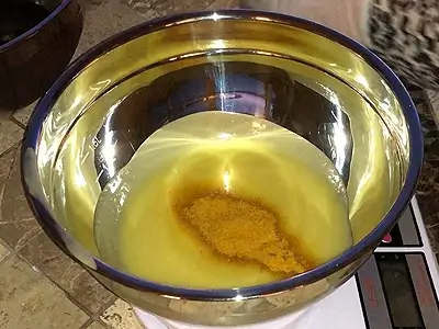 DIY Soap for Oily Skin Recipe. Add turmeric powder to the second bowl