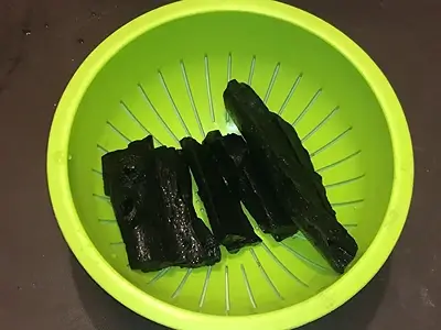 DIY Natural Activated Charcoal. Place the washed natural charcoal pieces in a sieve