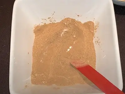 DIY Red Clay Mask with Rose Powder. Stir the powders