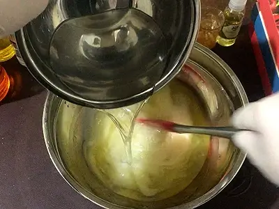 Moisturizing DIY Emulsified Body Butter Recipe. Pour the water phase over the oil phase while stirring