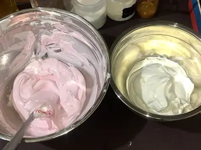 Moisturizing DIY Emulsified Body Butter Recipe. Two halves, one colored and one white as is