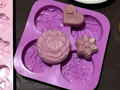 DIY Solid Lotion Bar for Dry Skin. After cooling, remove the bars from the mold